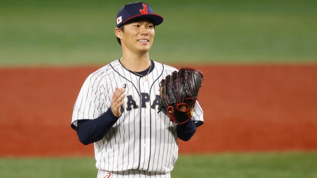 Yoshinobu Yamamoto reacts after a pitch during the Tokyo 2020 Olympic Summer Games.